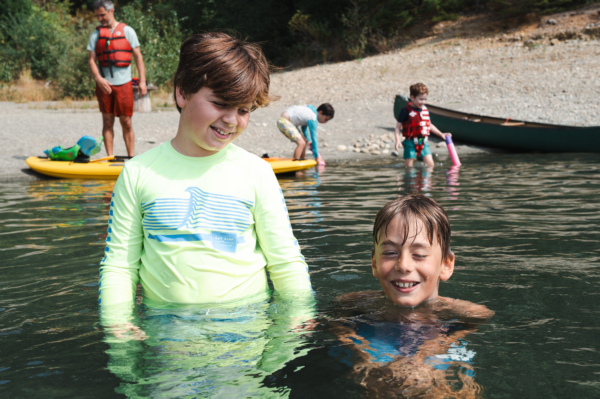 Kids swimming and laughing